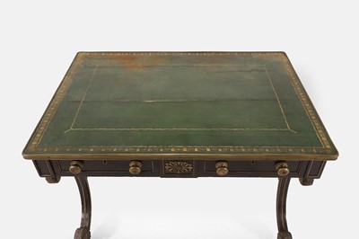 Lot 534 - A Regency ebonised and parcel-gilt writing table