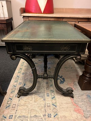 Lot 534 - A Regency ebonised and parcel-gilt writing table