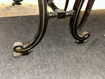Lot 534 - A Regency ebonised and parcel-gilt writing table