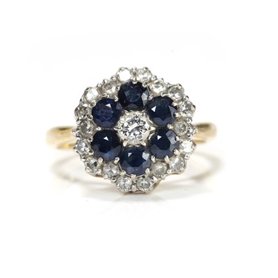 Lot 78 - An 18ct gold sapphire and diamond target cluster ring