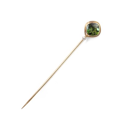Lot 40 - A tourmaline and diamond set stick pin