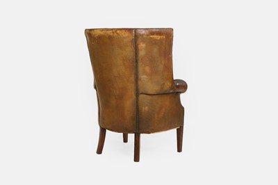 Lot 193 - A George III-style barrel-back leather armchair