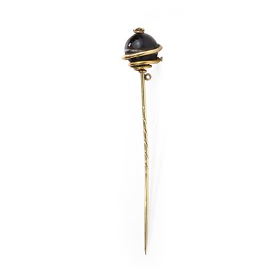 Lot 37 - A Victorian gold mounted onyx stick pin