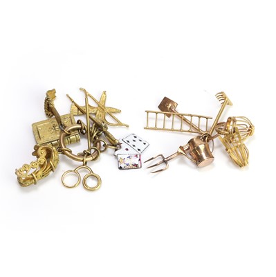 Lot 278 - A small collection of gold and gilt metal charms