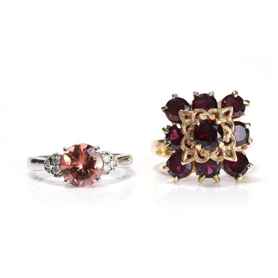 Lot 192 - An 18ct white gold red zircon and diamond ring and a garnet ring