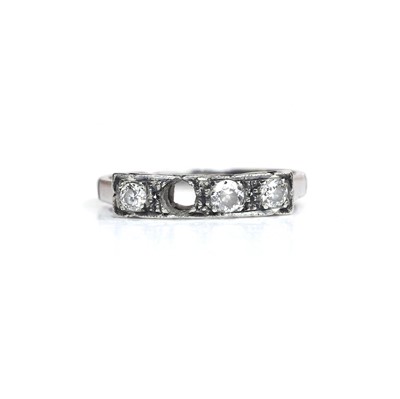 Lot 95 - A diamond half eternity ring