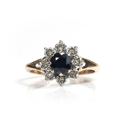 Lot 82 - A 9ct gold sapphire and diamond cluster ring