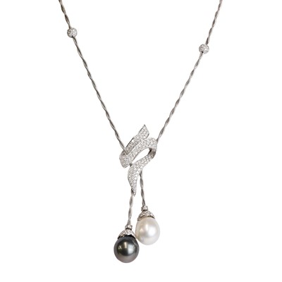 Lot 162 - A white gold pearl and diamond lariat necklace