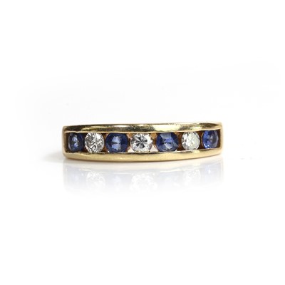 Lot 172 - An 18ct gold sapphire and diamond ring