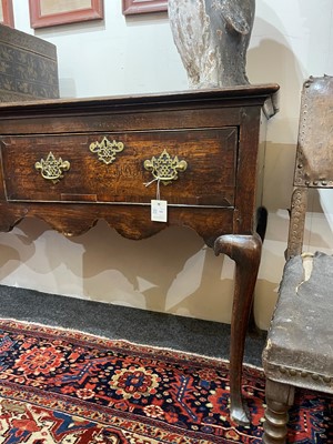 Lot 195 - A George II oak dresser