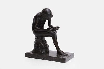 Lot 48 - A patinated bronze figure of the Spinario