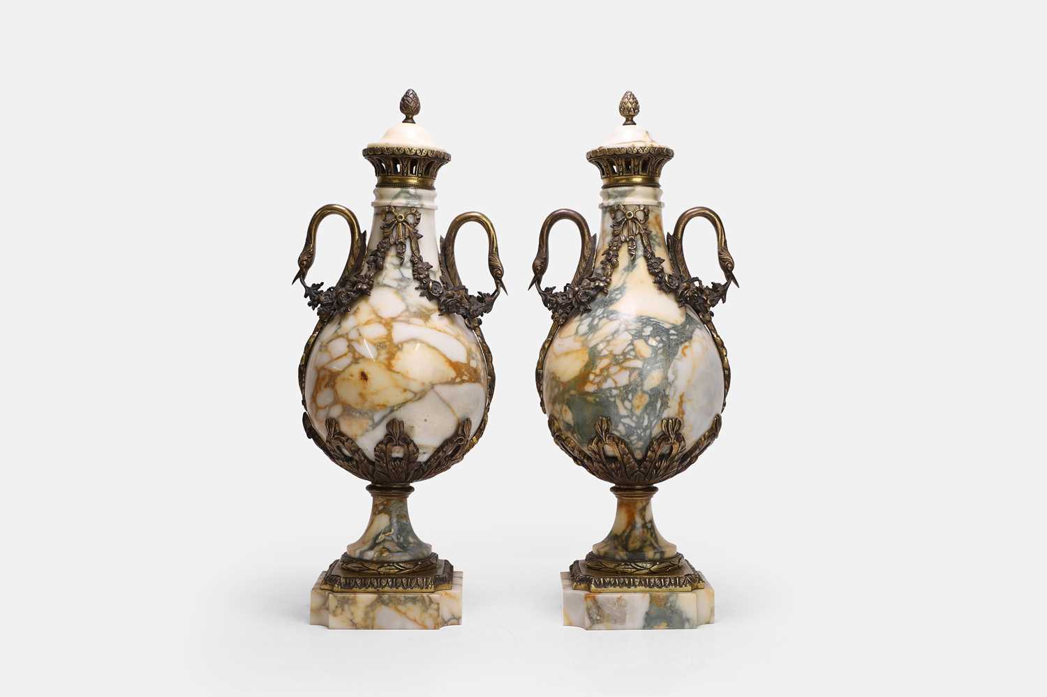 Lot 51 - A pair of Louis XVI-style marble urns
