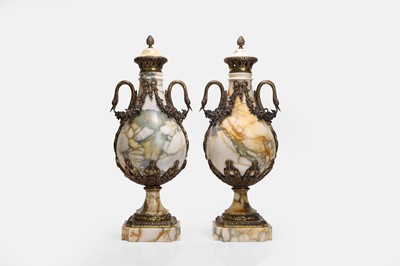 Lot 51 - A pair of Louis XVI-style marble urns