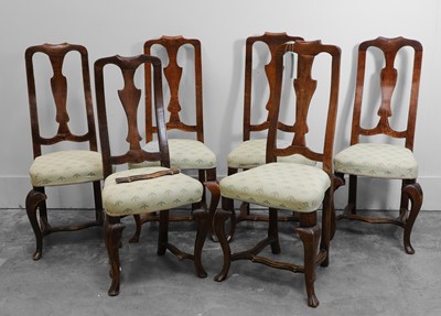 Lot 516A - A set of six Queen Anne style walnut dining chairs