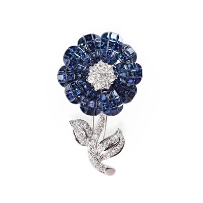Lot 160 - A sapphire and diamond floral brooch