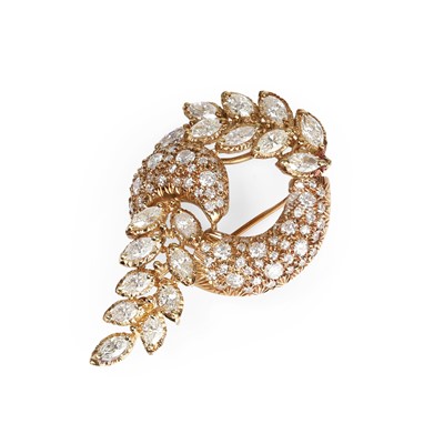 Lot 35 - A diamond scroll wreath design brooch
