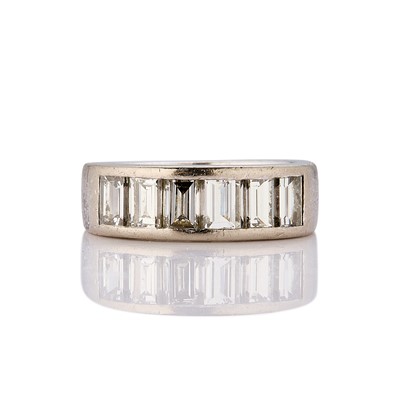 Lot 83 - A diamond half eternity ring