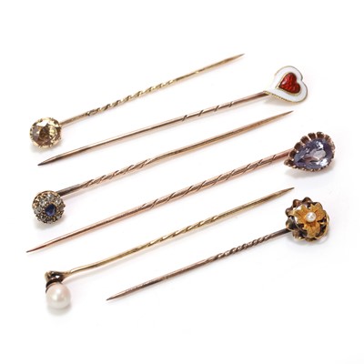 Lot 235 - A collection of gemstone set stick pins