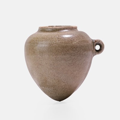 Lot 18 - A Chinese celadon bird feeder