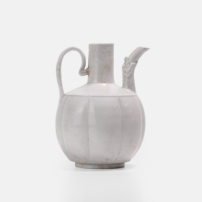 Lot 8 - A Chinese white-glazed ewer