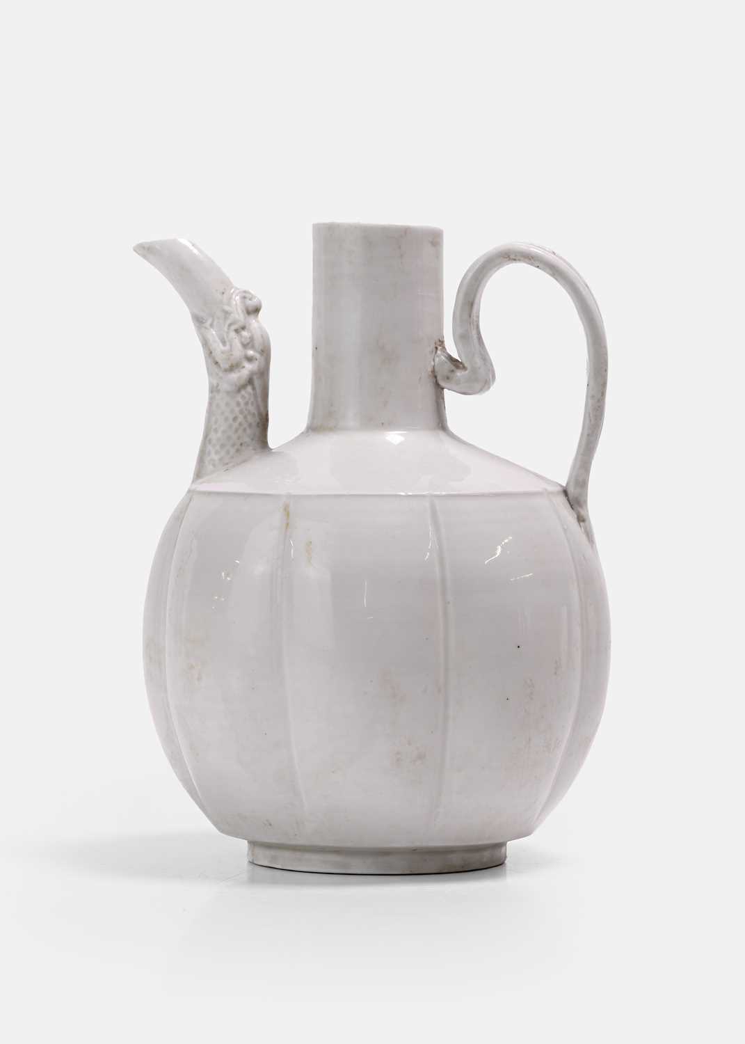 Lot 8 - A Chinese white-glazed ewer