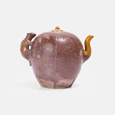 Lot 36 - A Chinese aubergine-glazed teapot