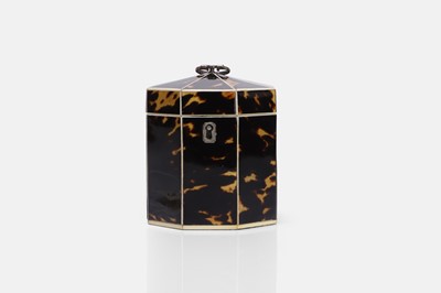 Lot 544 - A small George III tortoiseshell tea caddy