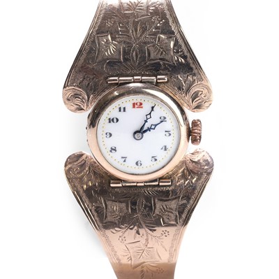 Lot 425 - A 9ct rose gold ladies' mechanical bangle watch
