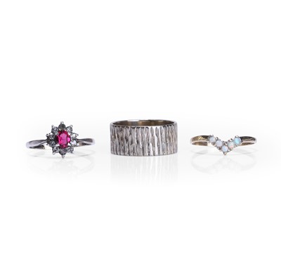 Lot 231 - A group of three rings