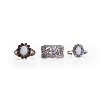 Lot 275 - A group of three gemstone set rings