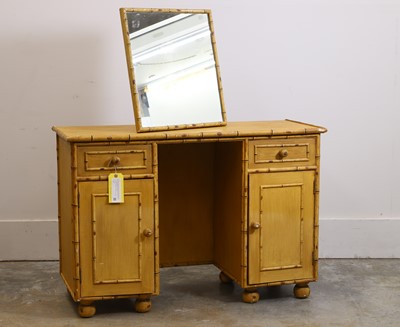 Lot 511 - A painted and simulated bamboo dressing table