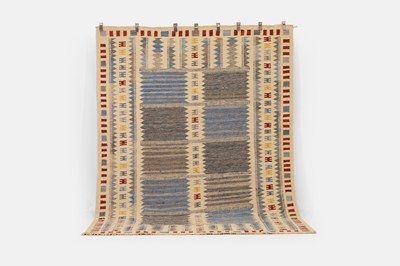Lot 576 - A flat-weave wool carpet in the style of Barbro Nilsson