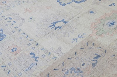 Lot 89 - An Oushak wool carpet