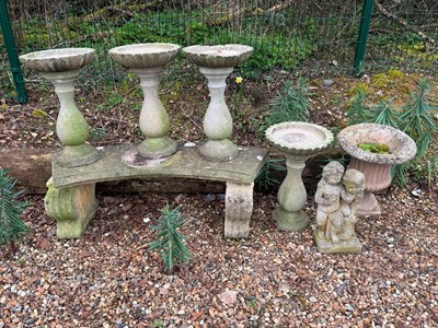Lot 552 - A collection of reconstituted garden items