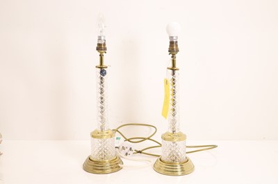 Lot 476 - A pair of brass and glass table lamps