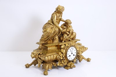 Lot 201 - A French gilt metal mantle clock