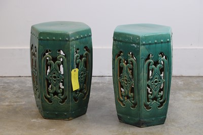 Lot 515 - A pair of Chinese green-glazed stools