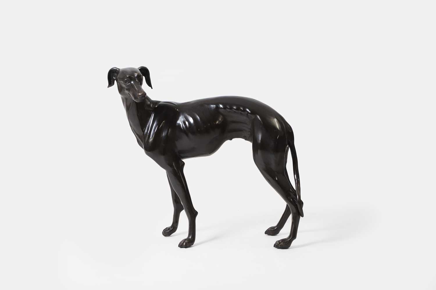Lot 65 - A large bronze greyhound figure