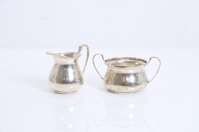 Lot 2 - A silver three piece tea set