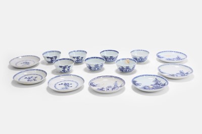 Lot 457 - A collection of 'Nanking Cargo' blue and white porcelain teacups and saucers