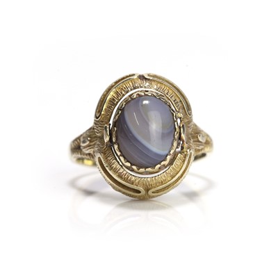 Lot 383 - A banded agate and malachite swivel ring