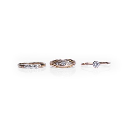 Lot 287 - A group of three diamond set rings
