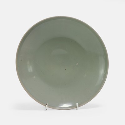 Lot 11 - A Chinese celadon-glazed dish