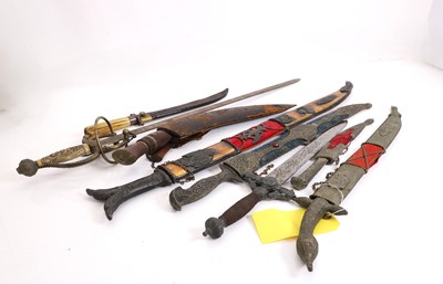 Lot 405A - A collection of Middle Eastern and European swords and daggers