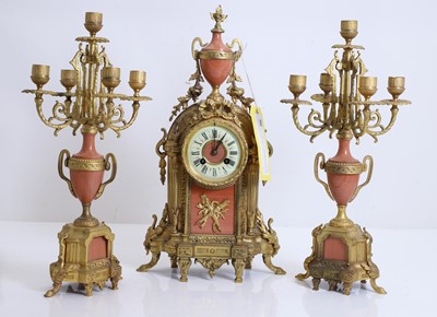 Lot 206 - A French gilt metal and marble clock garniture