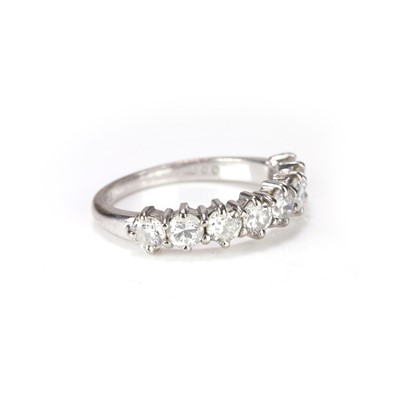 Lot 72 - An 18ct white gold diamond half eternity ring
