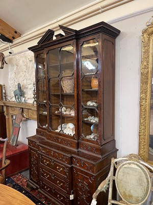 Lot 61 - A George III-style mahogany bookcase
