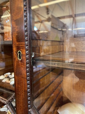 Lot 61 - A George III-style mahogany bookcase