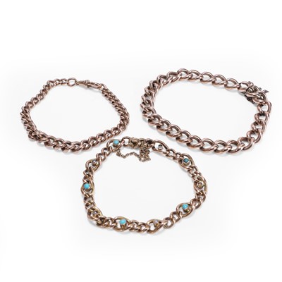 Lot 240 - A group of three early 20th century gold link bracelets