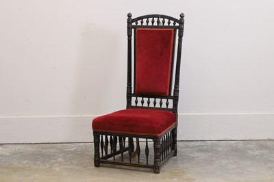 Lot 536 - An Aesthetic Movement ebonised armchair